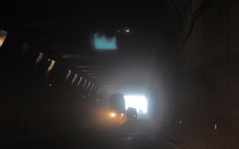 Traffic in one of the many galleries on the way to the strategically key Salang Tunnel north of Kabul. The galleries, concrete structures aimed at protecting traffic from avalanches, fell into disrepair in recent years and improving them is part of a $12.8 million construction contract recently awarded by the U.S. Army Corps of Engineers.