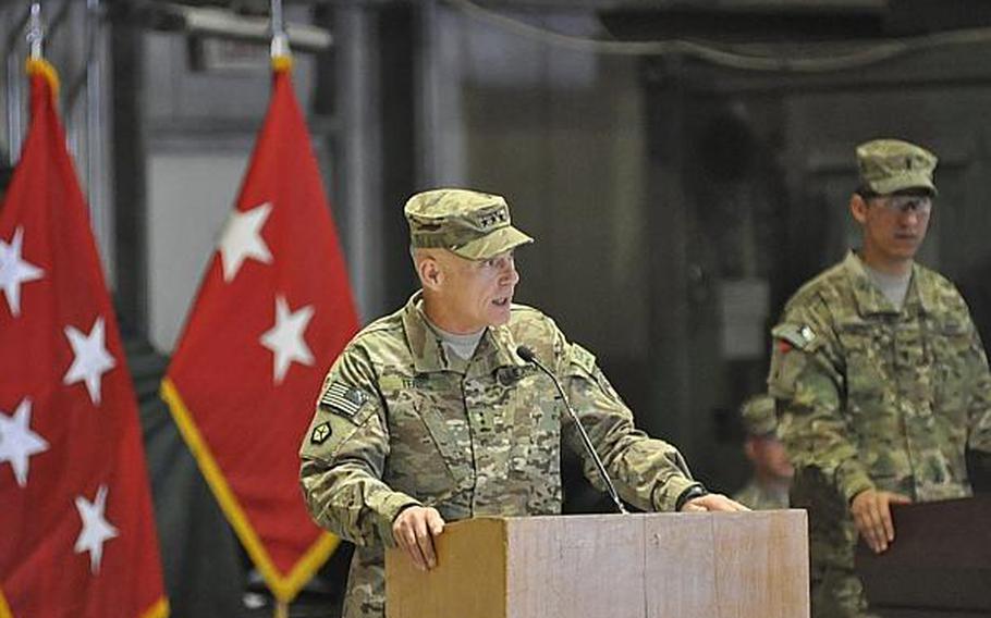 Lt. Gen. James Terry speaks at a change of command ceremony where he relinquished his post as commander of ISAF Joint Command and deputy commander of U.S. Forces-Afghanistan to Lt. Gen. Mark Milley.