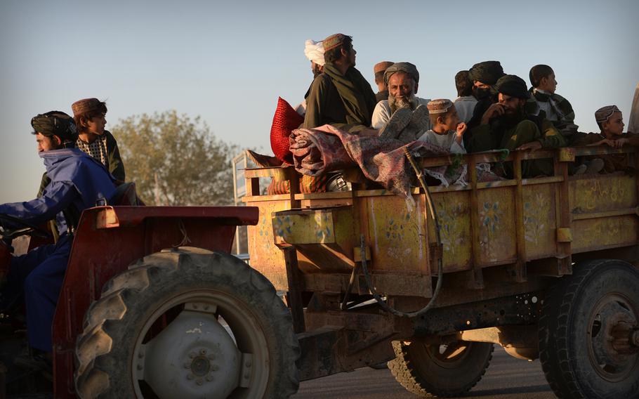 Residents of Sangin district in southern Afghanistan in September fled flighting that has rocked the area for most of 2014. Aid officials say at least 140,000 more Afghans have been displaced by fighting in 2014 alone.