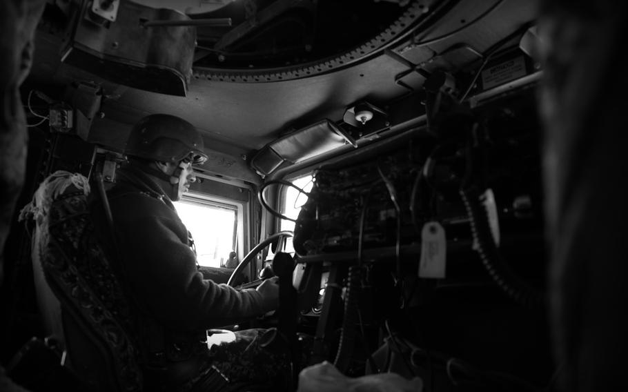 An Afghan National Army soldier drives an American-made Humvee during an operation in Kandahar province on Jan. 5, 2015. Afghan security forces use a wide range of surplus and sometimes new equipment provided by international donors.