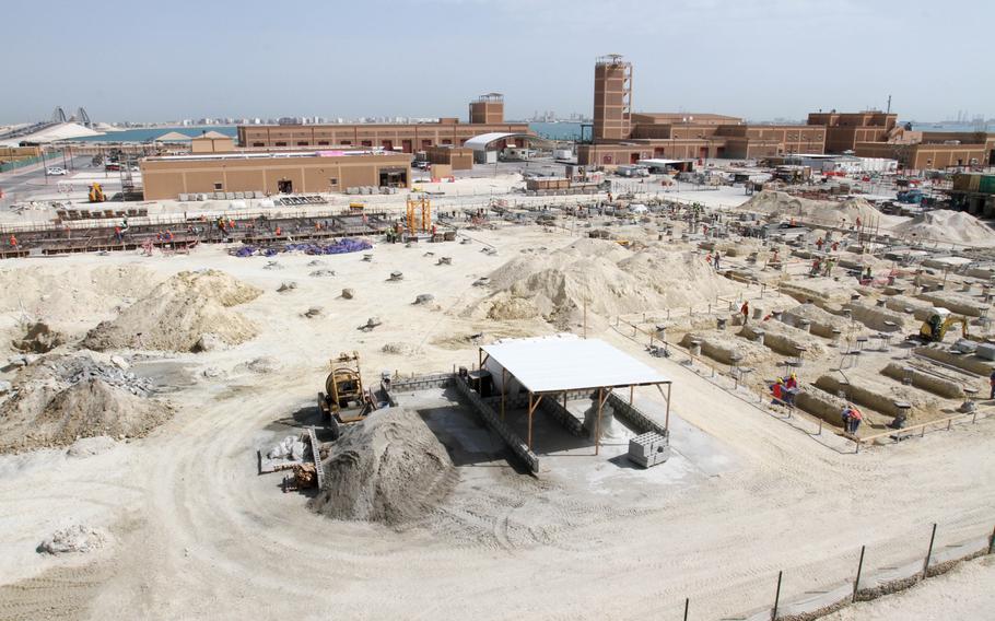 The view from the third floor of a barracks building under construction on Naval Support Activity Bahrain that will house 482 servicemembers with the ranks of E-4 and below. Construction is also underway on a dining facility and transient barracks across the street.