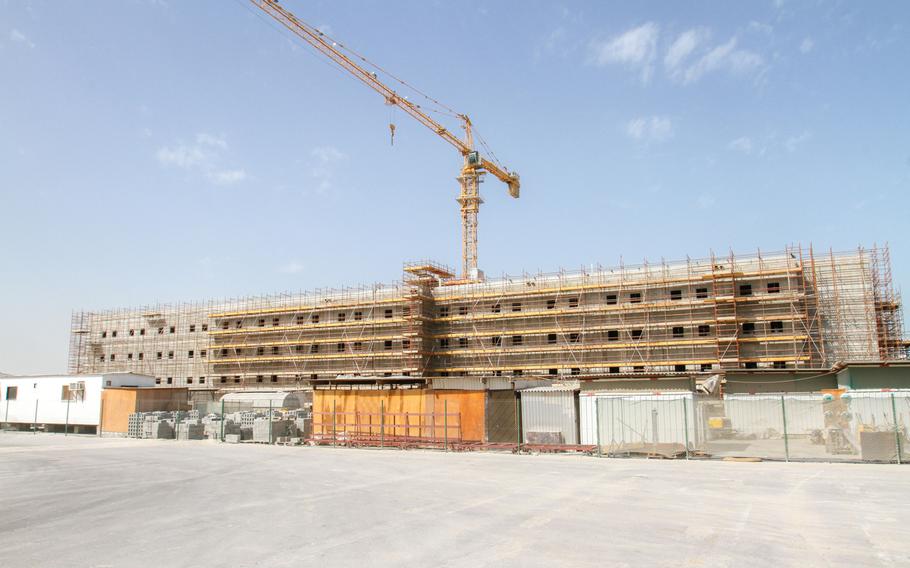 A barracks building under construction at Naval Support Activity Bahrain will have 241 apartments to house 482 servicemembers. Officials expect the $45.5 million building to be completed in December.