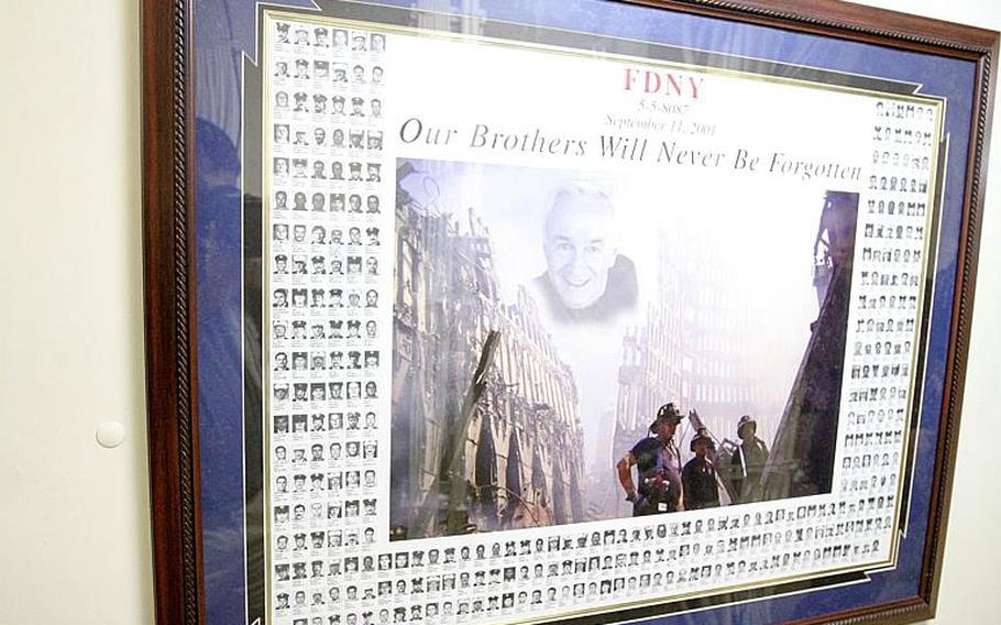Each morning Lt. Justin Bernard, the chaplain aboard the USS New York, gets a name from this picture outside his office with all 343 firefighters who died on  9/11. He researches the firefighter and prays for him in his evening prayer each night the ship is at sea.