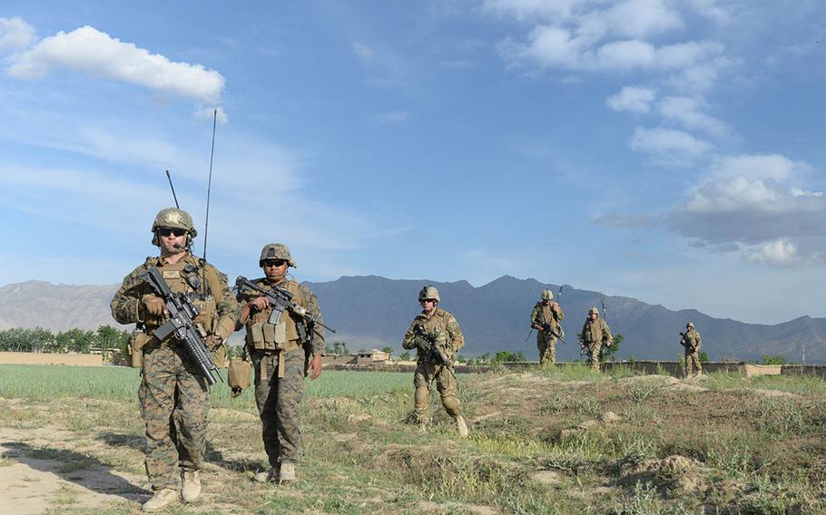 U.S. Marines and Georgian soldiers patrol near Bagram Airfield, May 9, 2015. The near daily patrols are designed to stem rocket and IED attacks against and around the logistics hub.