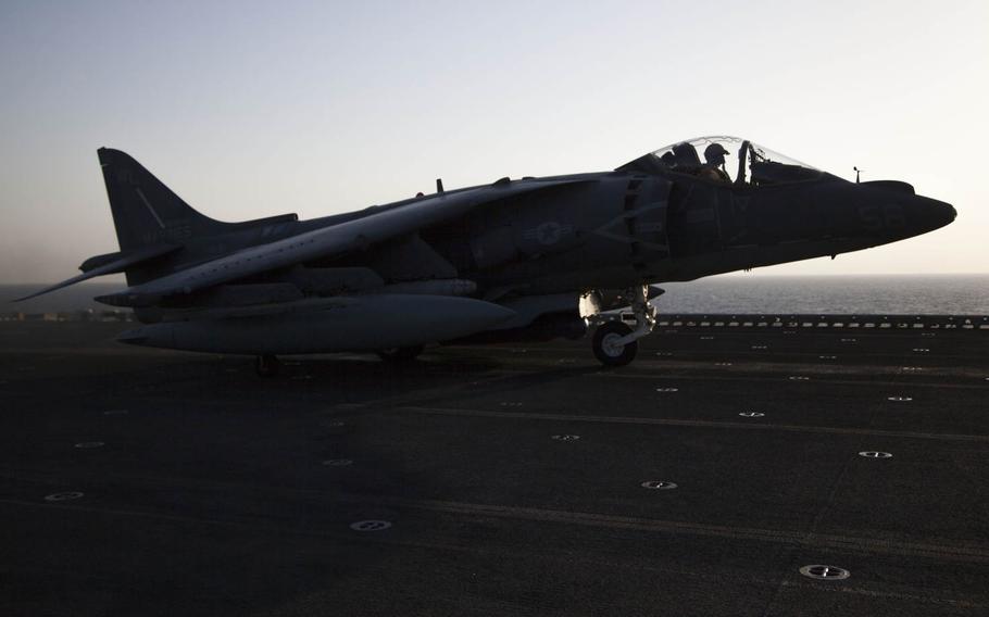 An AV-8B Harrier from the 15th Marine Expeditionary Unit launches off of the flight deck of the USS Essex, Oct. 13, 2015.