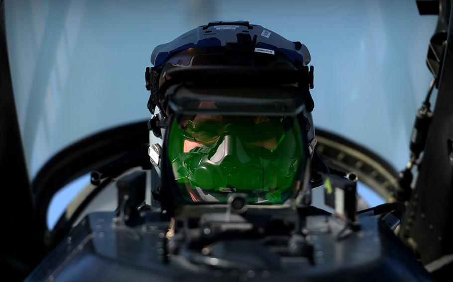 U.S. Air Force Capt. Josh ''Clunk'' Moffat prepares for a mission in the cockpit of an F-16 Fighting Falcon at Bagram Air Field in Afghanistan on Nov. 27, 2015. Fighter aircraft fly daily combat missions from the base, supporting both coalition and Afghan ground troops.
