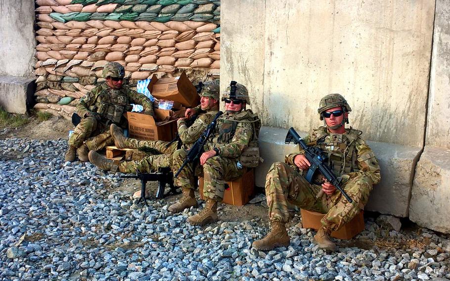 Soldiers of the Washington Army National Guard's 1st Battalion, 168th Aviation Regiment, 40th Combat Aviation Brigade, take a break at Forward Operating Base Joyce, Afghanistan.