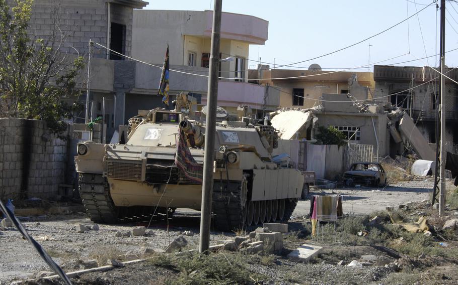 An Abrams tank with the Iraqi army's 9th Armored Division near Mosul on Thursday, Nov. 3, 2016. The division entered the city limits briefly on Wednesday but later withdrew and were returning on Thursday, according to a general with the division.