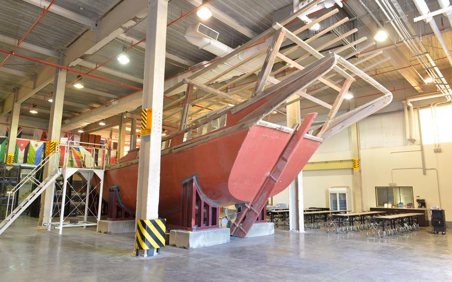 A fishing dhow rests in a facility used to train US and partner nations on ship boarding procedures on March 12, 2019 in Bahrain. The facility is known as the ship-in-a-box and serves as platform for the Coast Guard, Navy and partner nations to share best practices for visit, board, search and seizure tactics.