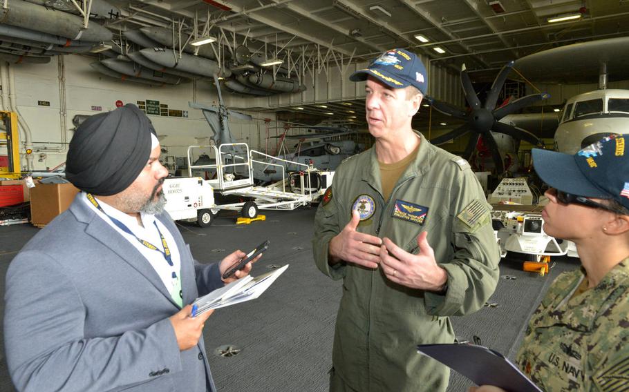 U.S. Navy Capt. Patrick Thompson, executive officer for the aircraft carrier USS John C. Stennis, speaks with reporters on Monday, March 25, 2019, in Manama, Bahrain. Stennis' crew of approximately 5,000 sailors is in Bahrain for rest and relaxation during a scheduled deployment to both 5th and 7th Fleet areas of operations.