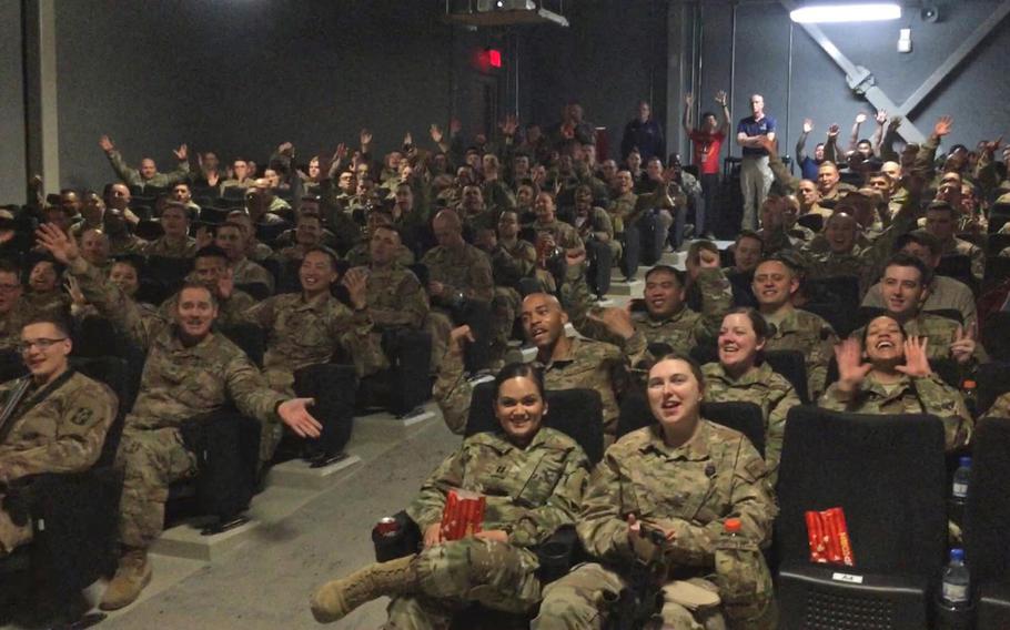 Troops deployed to Bagram Air Field, Afghanistan, await the movie "Avengers: Endgame" on May 1, 2019. Disney agreed to send the film to Bagram and Qatar Air Base after a military spouse tweeted to the company's CEO.