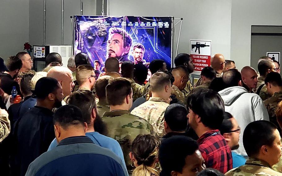 Troops deployed to Bagram Air Field, Afghanistan, line up to watch the movie "Avengers: Endgame" on May 1, 2019.