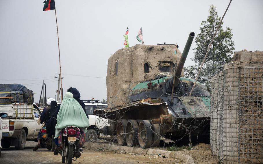 A small checkpoint built around the wreck of a Soviet tank on the outskirts of Lashkar Gah, in Helmand province, was on display April 14, 2019.