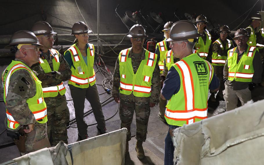 Members of the U.S. Corps of Engineers Transatlantic Division leadership team and members of the Mosul Dam Task Force take a tour inside the outlet tunnels at Mosul Dam, outside the City of Mosul in Iraq, on June 14, 2019. There are two bottom outlet tunnels at the dam, each measuring approximately 33 feet in diameter, which is large enough to build a three-story house inside.

