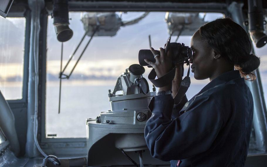 Ensign Marieme Gueye, aboard the amphibious assault ship USS Boxer, stands watch on the bridge in the Indian Ocean, Friday, June 21, 2019.  The Boxer Amphibious Ready Group and 11th Marine Expeditionary Unit arrived in the U.S. 5th Fleet area of operations, Monday, June 24, 2019, relieving the Kearsarge ARG and 22nd MEU.