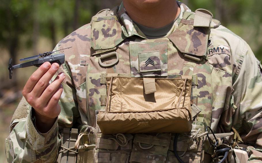 SGT Richard Molina, B. Co., 3rd Brigade Combat Team, 82nd Airborne Division, shows off the Soldier Borne Sensors system during its initial fielding at Ft. Bragg, N.C., May 2, 2019. The system contains a base station, hand controller, display, and two air vehicles, all man-portable.
