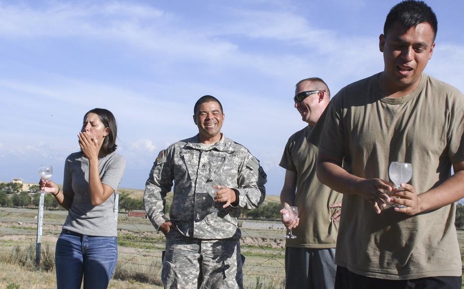 U.S. soldiers, from left to right, Spc. Shyla Alam, Staff Sgt. Anthony McGee, Sgt. 1st Class Lucas Hansen and Spc. Uriel Ochoa, have different reactions after trying the Kazakh specialty kumis, or fermented horse milk. The soldiers were in Kazakhstan in June 2019 for the annual Steppe Eagle exercise.
