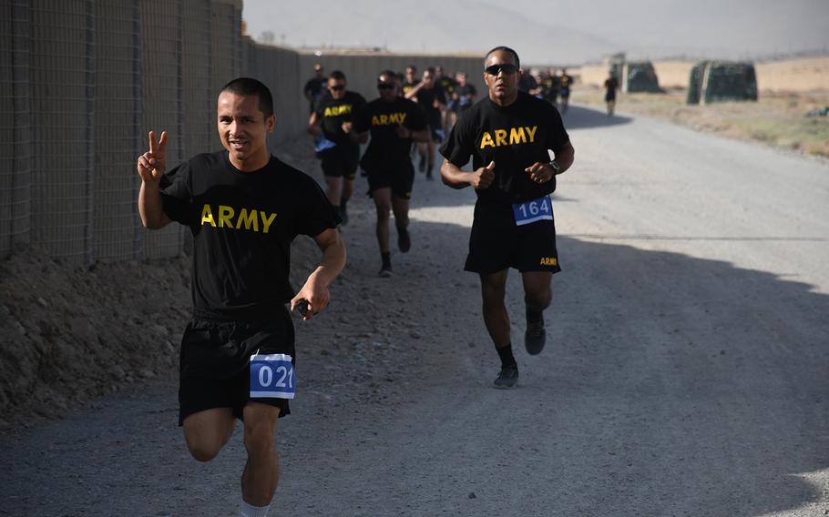 U.S. soldiers near the end of a 5-kilometer race at Forward Operating Base Dahlke on Thursday, July 4, 2019. The race was organized to mark Independence Day.