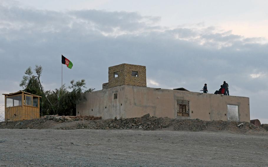 Afghan security forces man a checkpoint on the outskirts of Kandahar city on April 10, 2019. A U.S. watchdog report in July said Afghan forces were significantly understaffed.
