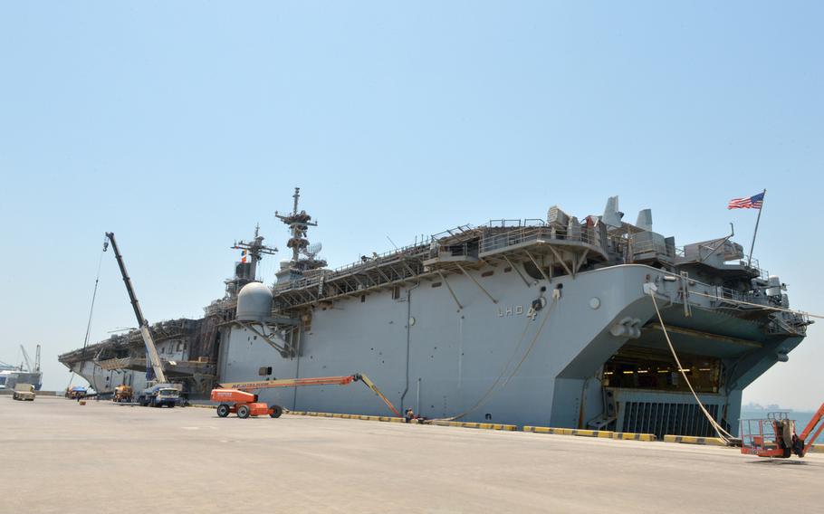 The amphibious assault ship USS Boxer is seen pierside at Bahrain's Khalifa bin Salman Port on Aug. 1, 2019. The Boxer pulled into Bahrain on July 25 for a scheduled weeklong port visit just days after making headlines for downing at least one drone during inbound transit through the Strait of Hormuz.