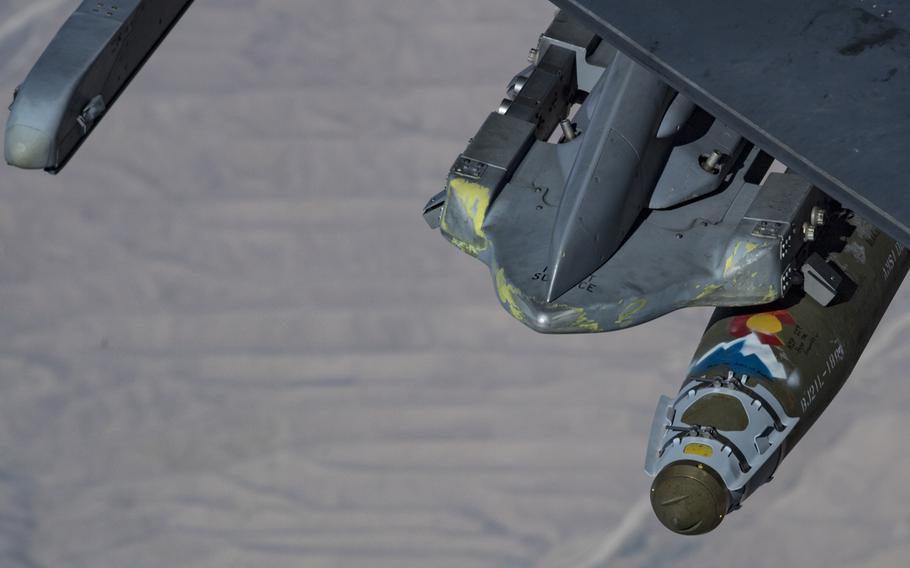 An F-16 Fighting Falcon with a bomb attached to its wing pylon flies over Afghanistan, Aug. 24, 2019. The U.S. dropped more munitions in September than any other month in the last 10 years.