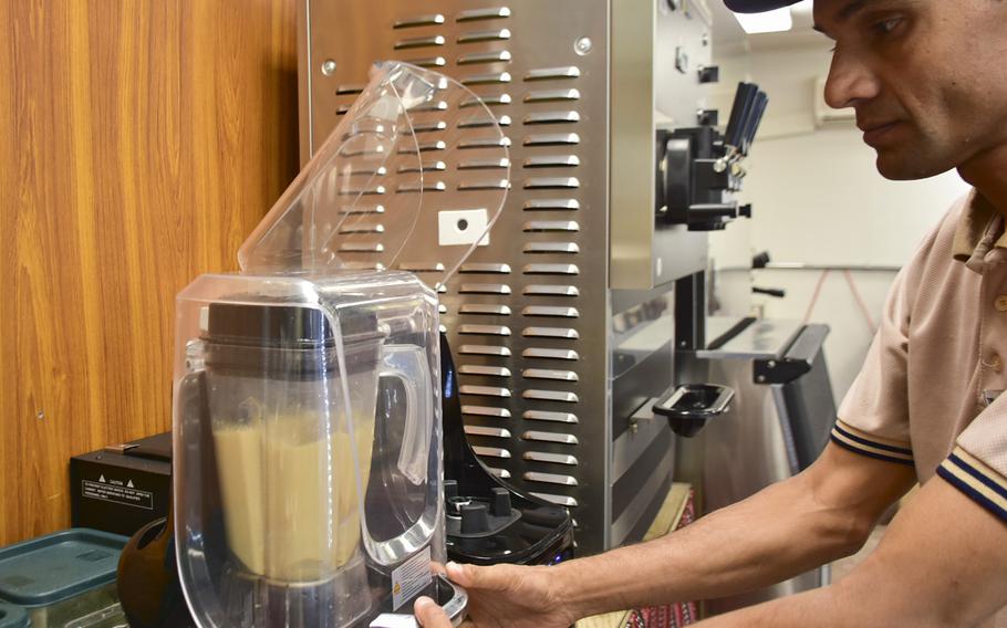 Dev Raj Neupane, a worker from Nepal, prepares a smoothie at BAF Cafe at Bagram Air Base, Sept. 19, 2019. The base?s newest eatery aims to recreate an authentic Afghan tea shop experience for troops and others on base.