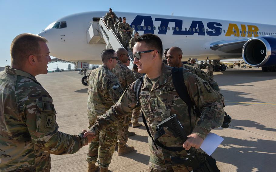U.S. Army soldiers arrive at Prince Sultan Air Base in Saudi Arabia, October 21, 2019. In a letter sent to Congress on Nov. 19, 2019, President Donald Trump said the U.S. is sending more troops to Saudi Arabia to "guard against hostile actions by Iran and its proxy forces."