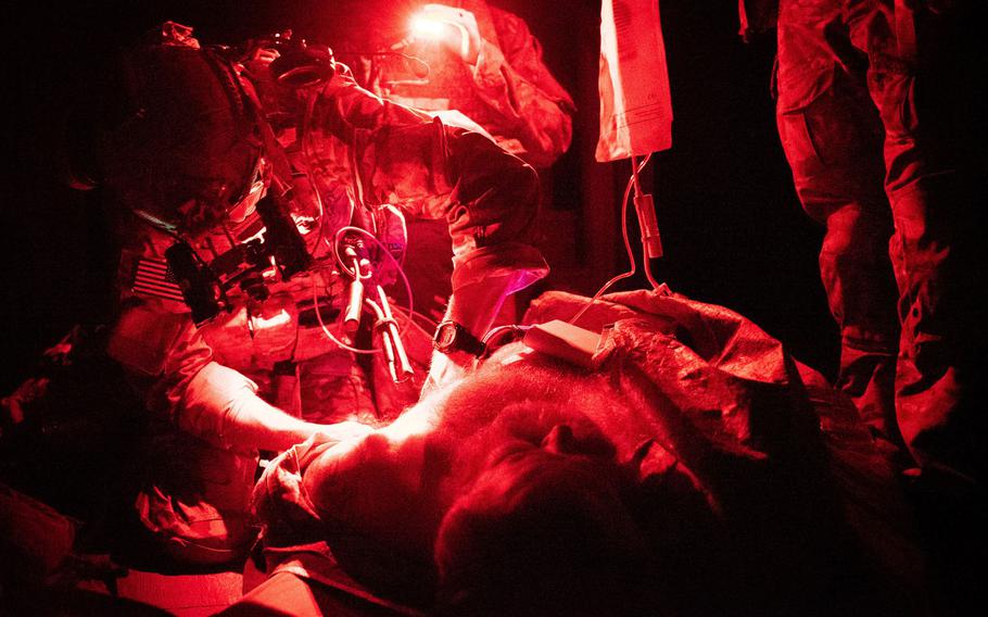 A U.S. Army Ranger combat medic takes part in routine medical training  in August 2019. The Ranger O-Low Titre protocol is practiced multiple times a year to allow volunteer blood donors and medics to maintain a high level of medical proficiency.