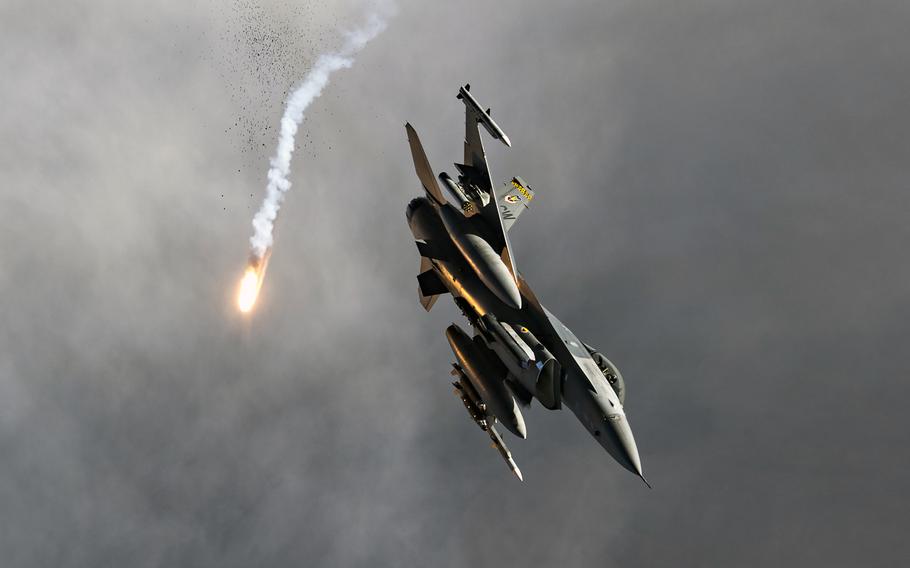 An Air Force F-16 Fighting Falcon from the 79th Fighter Squadron at Shaw Air Force Base, S.C., releases flares over Afghanistan, Nov. 12, 2019. The U.S. dropped more bombs and other munitions in Afghanistan last year than any other year since documentation began in 2006, Air Force data shows.