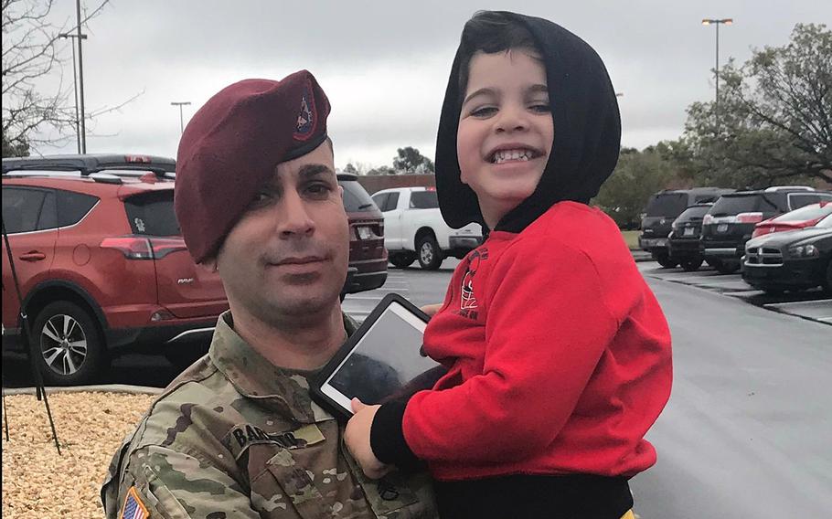 Sgt. 1st Class Elis A. Barreto Ortiz, 34, from Morovis, Puerto Rico, holds his son, Jacknel Barreto-Aponte, now 4. Barreto died Sept. 5, 2019, when a Taliban suicide bomb hit his convoy in the Afghan capital.