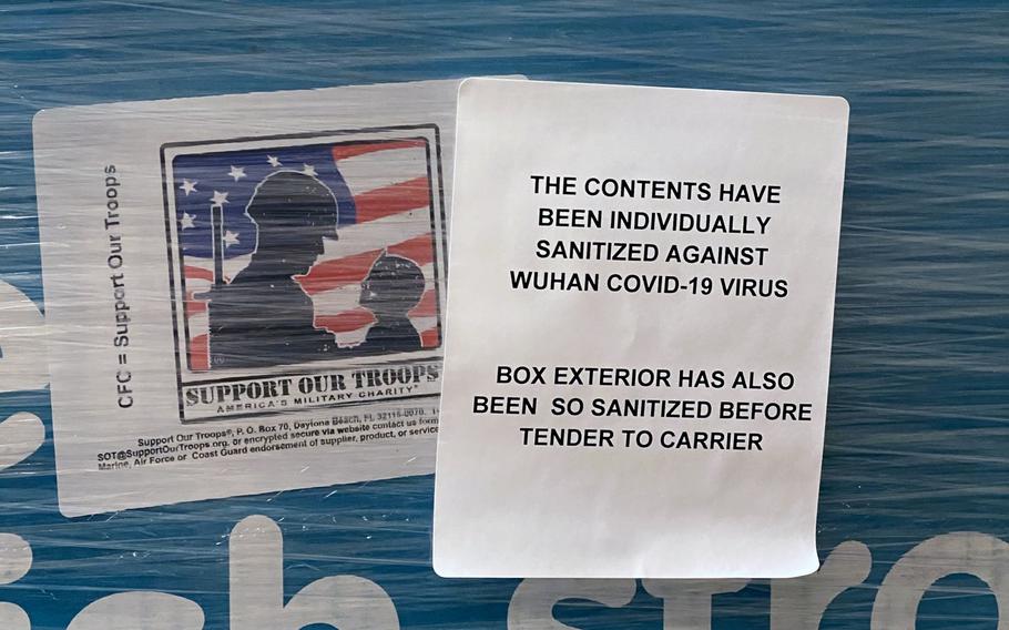 A sticker on a care package for deployed service members states that workers with Support Our Troops, a charity based out of Tampa, Fla., have sanitized the surfaces of each item placed inside, in response to the coronavirus pandemic.
