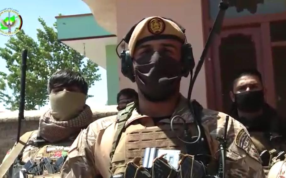 A special forces soldier assigned to Afghanistan's National Directorate of Security speaks in a video statement released by the NDS on Wednesday, May 6, 2020, after a series of raids the night before. The soldier said five members of an Islamic State terror cell blamed for attacks on Bagram Airfield were killed in the raids.