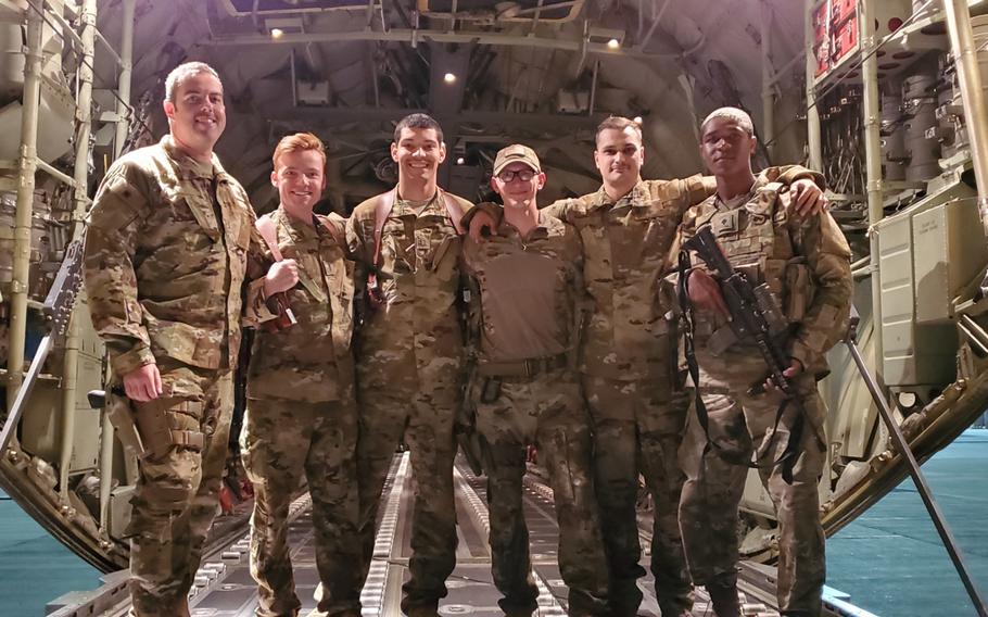 A 39th Airlift Squadron crew, based out of Dyess Air Force Base, Texas, and deployed with the 774th Expeditionary Airlift Squadron, poses in Afghanistan in September 2019. 