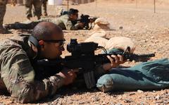 Coalition forces zero Smart Shooter sighting devices during familiarization range training near al-Tanf garrison, Syria, May 30, 2020. 

