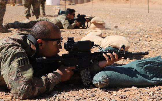 Coalition forces zero Smart Shooter sighting devices during familiarization range training near al-Tanf garrison, Syria, May 30, 2020. 

