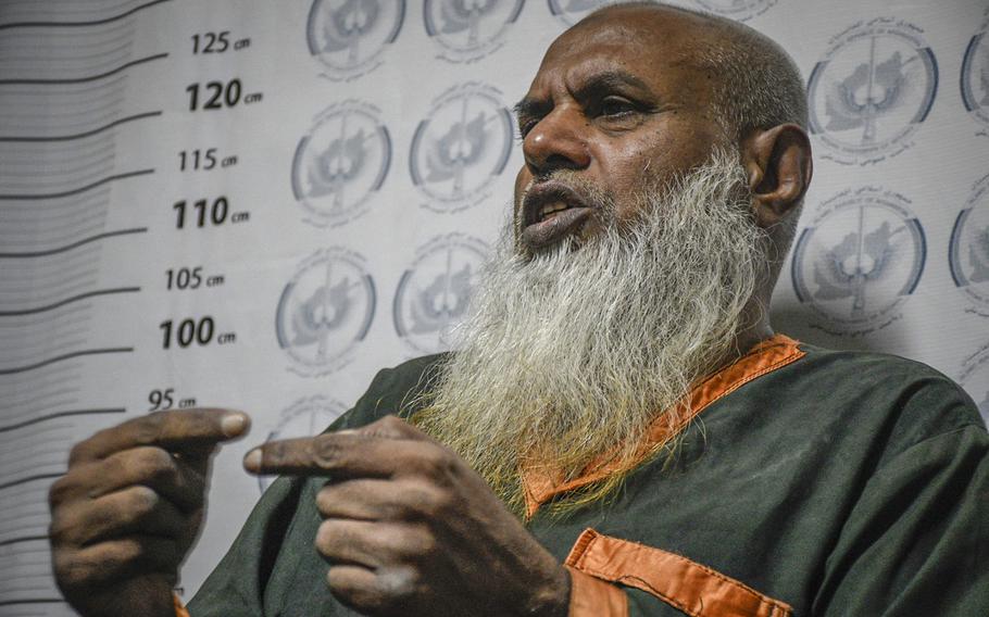 Khalid Haider, 54, a former member of the Islamic State in Afghanistan and al-Qaida, speaks in an Afghan government prison July 18, 2020. Haider said he crossed the border from his home country of Pakistan to join the Islamic State in 2016 and was arrested this spring.