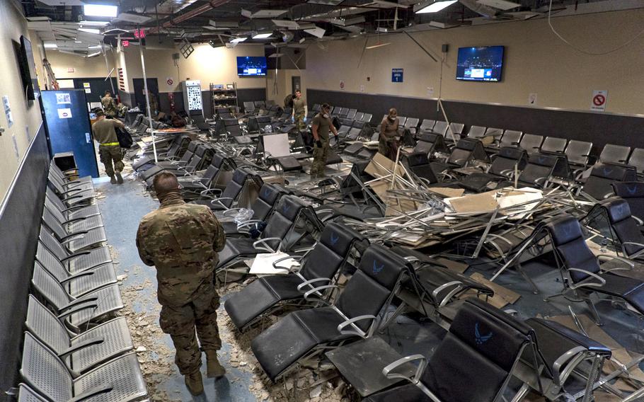 U.S. airmen from the 405th Expeditionary Support Squadron clear debris from inside the passenger terminal at Bagram Airfield on Dec. 12, 2019, a day after a Taliban-led attack on the facility. Iran has been accused  of paying Taliban fighters to kill American and other coalition troops in the country, CNN said in a report.