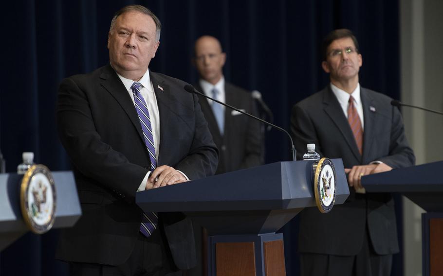 Secretary of State Mike Pompeo and Defense Secretary Mark T. Esper, among others, hold a press conference during the 2020 Australia-U.S. Ministerial consultations at the State Department, July 28, 2020. A letter was sent to both of their departments Monday demanding they provide witnesses to testify at a Sept. 9 hearing in Congress on the war in Afghanistan and the peace process.