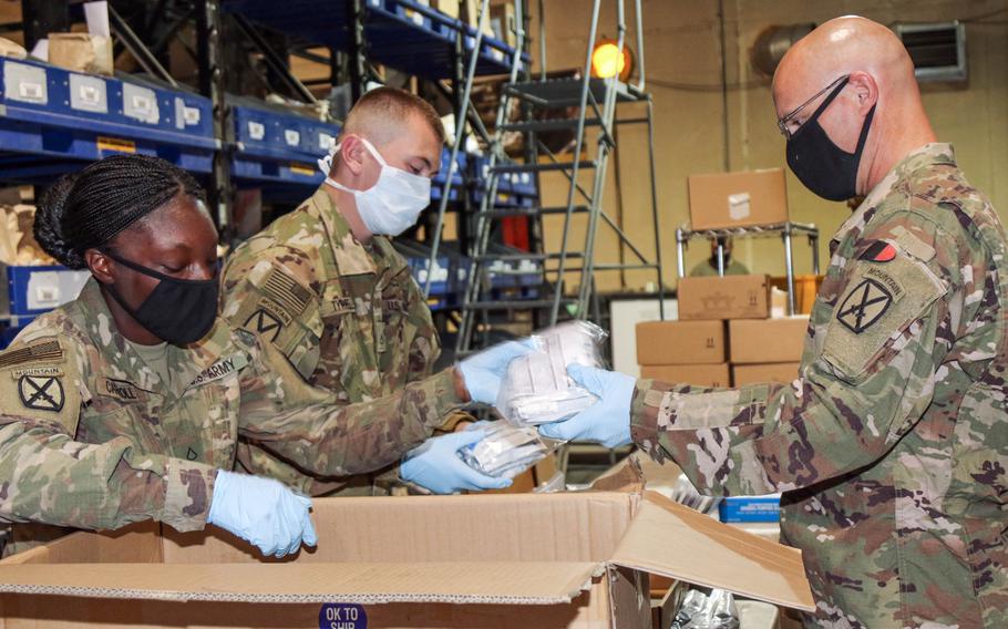 Soldiers from 10th Mountain Division sort testing kits for movement to forward operating base at Bagram Airfield, Afghanistan, April 24, 2020. A report released Monday, Sept. 15, 2020, by the Eurasia Group Foundation found that a majority of Americans prefer diplomacy over military intervention and want the U.S. to withdraw from Afghanistan.