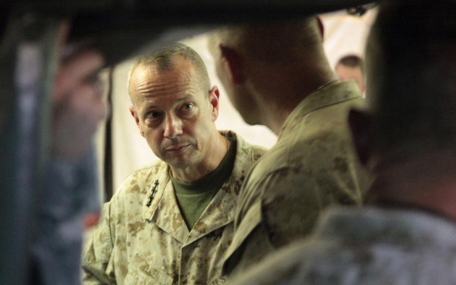 Gen. John R. Allen, commander of the International Security Assistance Force and U.S. Forces - Afghanistan, during a tour in August 2011 of a remote base in Gereshk district, Helmand province, Afghanistan.