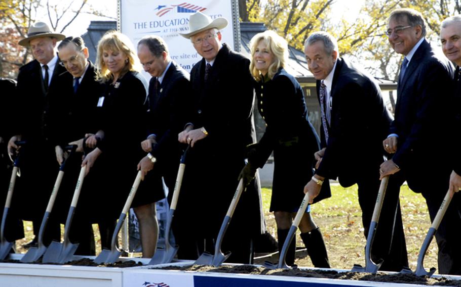 Secretary of Defense Leon Panetta, Dr. Jill Biden and other dignitaries break ground for the Education Center at the Wall in Washington, D.C., November 28, 2012.