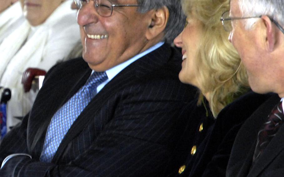 Secretary of Defense Leon Panetta talks with Dr. Jill Biden during the groundbreaking ceremony for the Education Center at the Wall in Washington, D.C., on November 28, 2012.