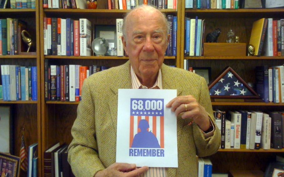 Former Secretary of State George Shultz poses for a ''68,000 Remember'' photo.