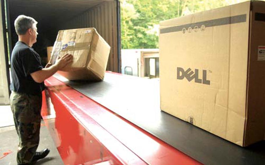 An airman sorts incoming packages at Ramstein Air Base, Germany.