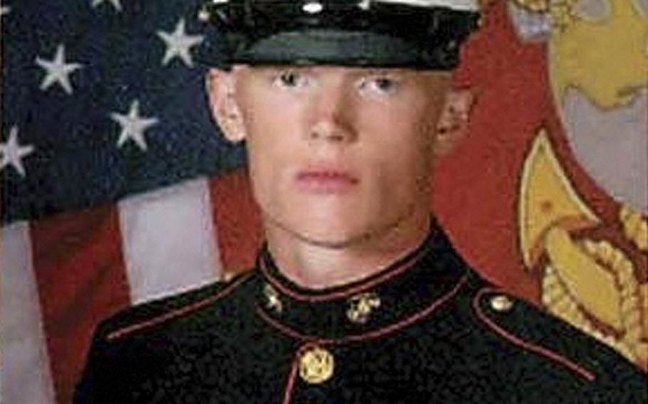 In this undated photo released by the U.S. Marine Corps, Marine Lance Cpl. Josh Taylor poses for a photograph. Taylor 21, with the 2nd Marine Expeditionary Force from Camp Lejeune, N.C., was killed with 6 other Marines after mortar shell  exploded during a training exercise at the Hawthorne, Nev., Army Depot. 