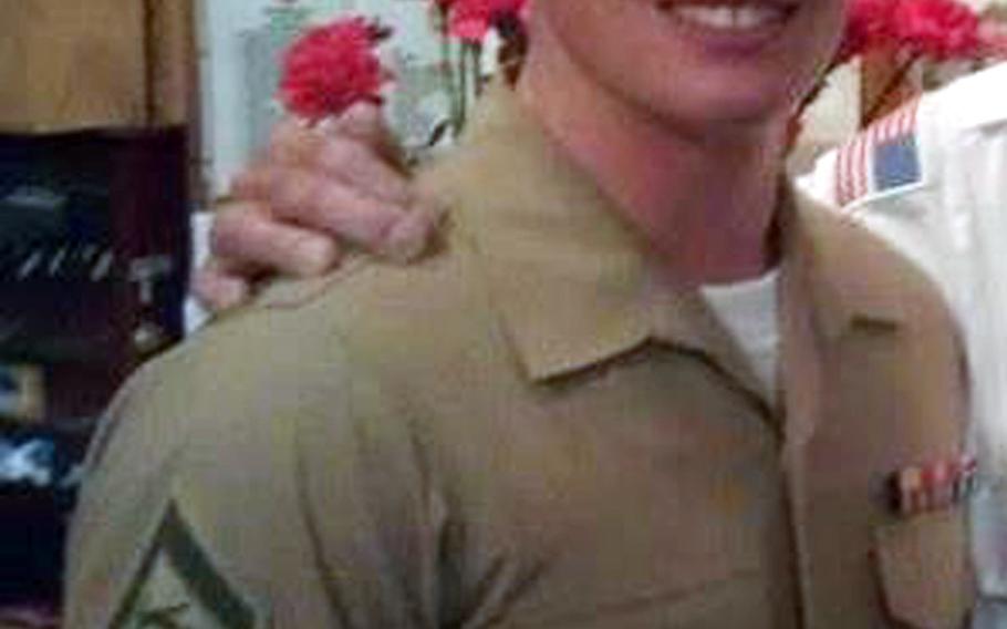This undated photo provided by the U.S. Marines shows Lance Cpl. Joshua C. Taylor of Marietta, Ohio. Taylor, 21, was killed with six other Marines in an explosion during a Nevada training exercise on Monday, March 18, 2013. 