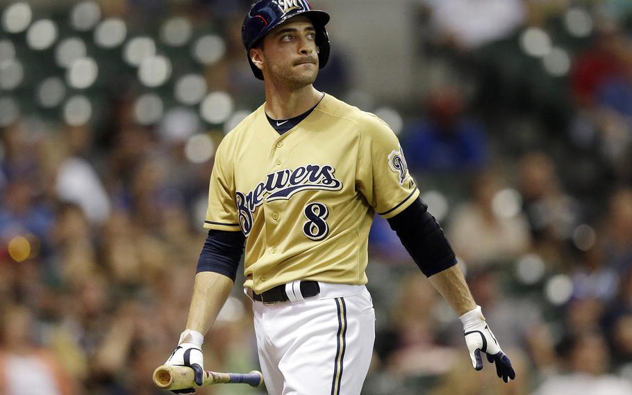 Milwaukee Brewers' Ryan Braun reacts after striking out after pinch hitting during the 11th inning of a baseball game against the Miami Marlins on July 21, in Milwaukee. Braun, the 2011 National League MVP, has been suspended without pay for the rest of the season and admitted he "made mistakes" in violating Major League Baseball's drug policies. MLB Commissioner Bud Selig announced the penalty Monday and released a statement by the Milwaukee Brewers slugger, who said: "I am not perfect. I realize now that I have made some mistakes. I am willing to accept the consequences of those actions." (AP Photo/Morry Gash)