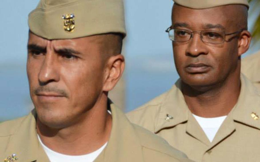 Master Chief Hospital Corpsman Robert Banuelos, left, and Capt. Daryl K. Daniels, commanding officer of U.S. Naval Hospital Guantanamo Bay.