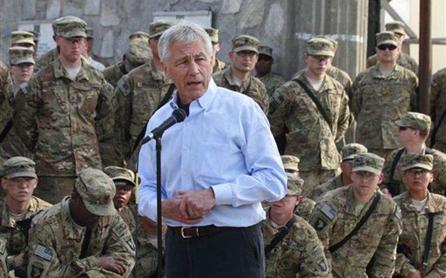Defense Secretary Chuck Hagel speaks to members of the U.S. Army 101st Airborne Division at Jalalabad Airfield in eastern Afghanistan, in March 2013. Legal experts say Hagel and other senior officials can talk about sexual assault, but they should avoid references to specific punishments and outcomes.