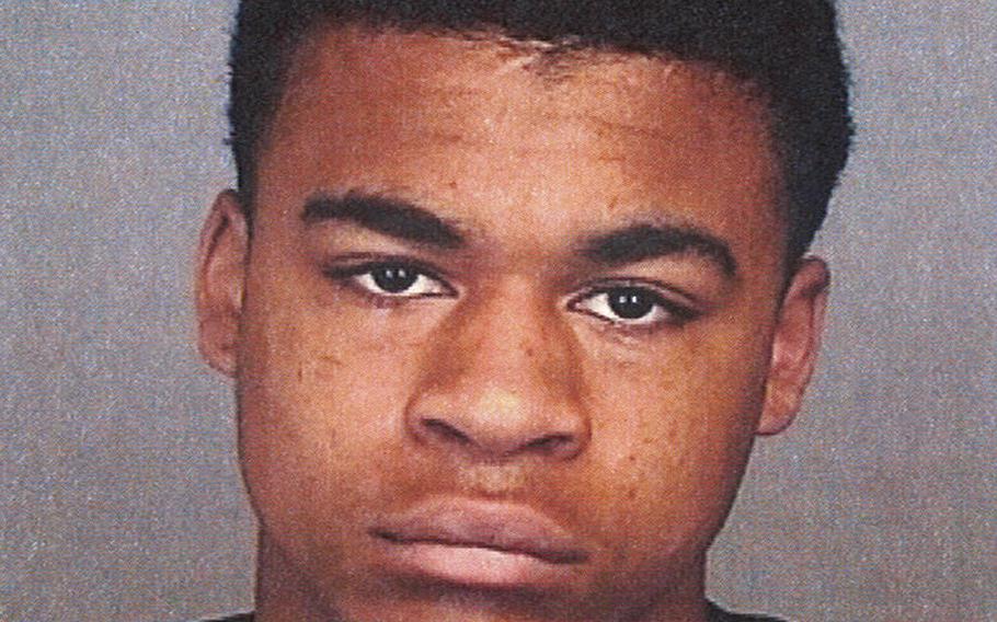 This image from the Spokane, Wash., Police Department shows Kenan Adams-Kinard, 16, who is being sought by police in connection with the beating death of an 88-year-old World War II veteran outside an Eagles lodge in Spokane on Wednesday, Aug. 21, 2013. 